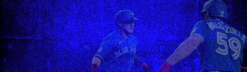 Blue-toned-baseball-scene-with-Toronto-Blue-Jays-players-celebrating-on-the-field_