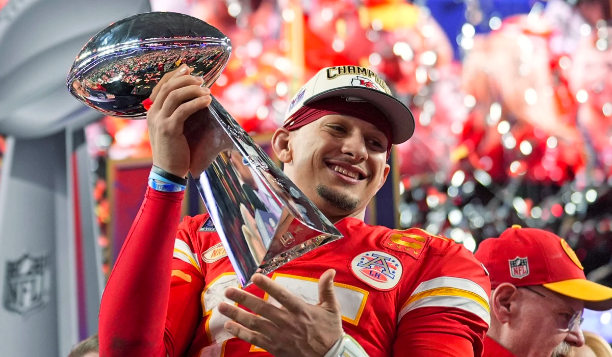 A-NFL-player-winner-holding-the-SuperBowl-trophie