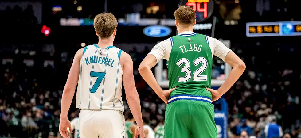 NBA-players-Nueppel-and-Flagg-playing-a-NBA-match-in-the-court