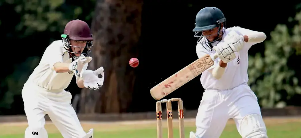 image-of-two-boys-playing-Cricket