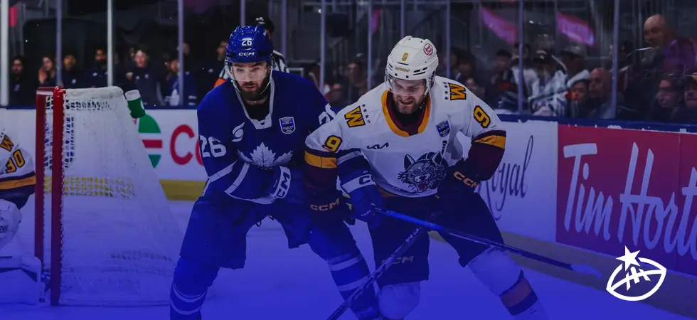 Two-NHL-players-fighting-for-the-ball